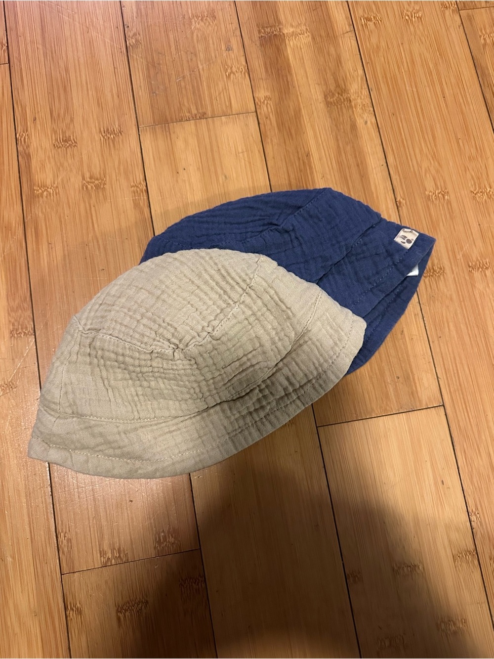 BearPaw Infant Gauzy Cotton Bucket Hat 2 Pack Bundle in Navy and Beige